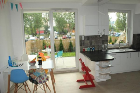 Sunny Apartment by the Beach! childrens' paradise with garden patio